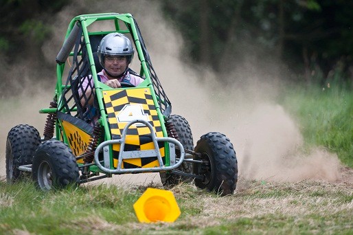 Racing a buggy in a field
